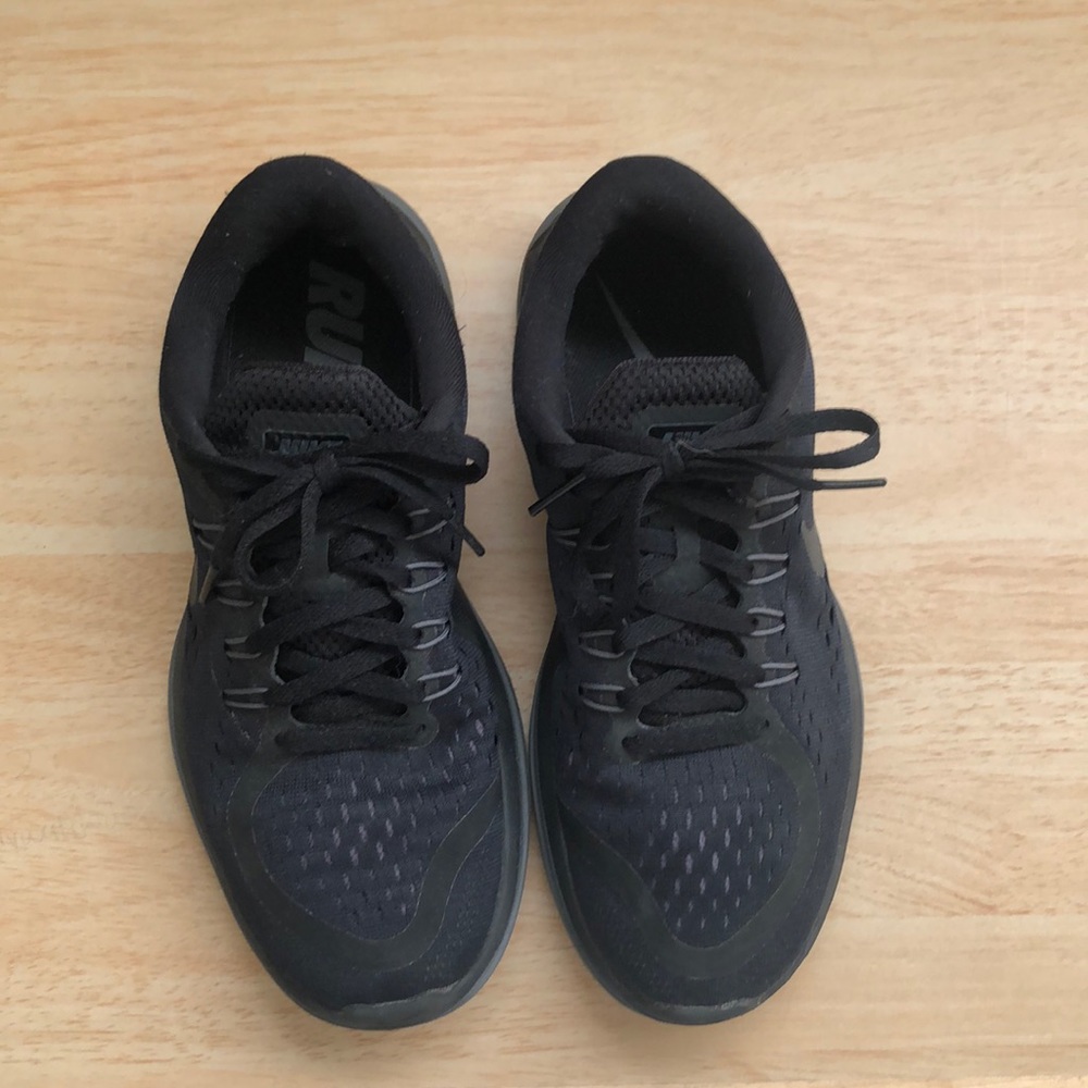 Nike black running shoes.